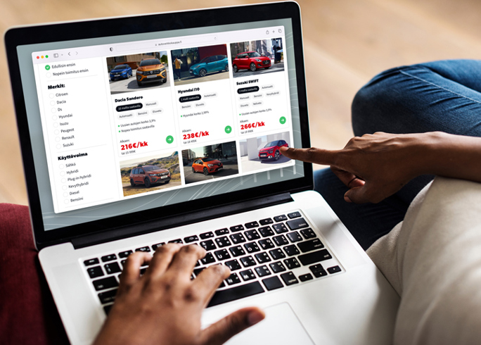 Laptop with hands pointing to the screen 